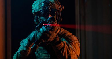 A Royal Australian Air Force Airfield Defence Guard from No. 2 Security Forces Squadron conducts a building clearance during Exercise Urban Nomad at RAAF Base Amberley. Story by Flight Lieutenant Suellen Heath. Photo by Leading Aircraftwoman Emma Schwenke.