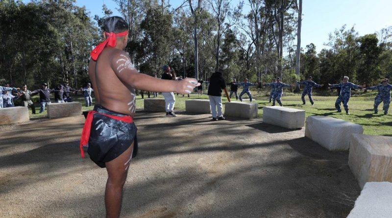 Lyric from the Nunukul Yuggera Dance Troupe leads the members and guests in a traditional dance at the opening of the Amberley Indigenous Cultural Precinct. Story by Flying Officer Greg Hinks. Photo by Corporal Brett Sherriff.