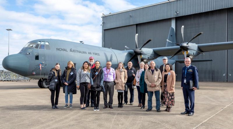 Participants of the Australian Industry Defence Network in front of a C-130J Hercules during a visit to RAAF Base Richmond. Story by Eamon Hamilton. Photo by Corporal Dan Pinhorn.
