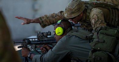 Australian Army rifleman Corporal Joshua Townsend coaches a soldier from the Republic of Fiji Military Forces during a live-fire qualifying shoot at Gallipoli Barracks. Story by Warrant Officer Class Two Max Bree. Photo by Corporal Nicole Dorrett.