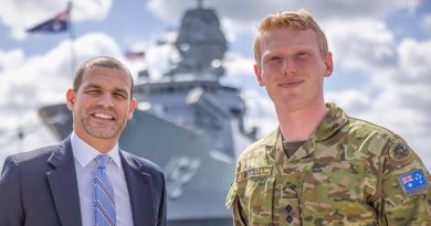 US Special Agent Justin Smith and Australian Army Captain Nicholas Wood pose in front of Royal Australian Navy frigate HMAS Warramunga at Joint Base Pearl Harbor-Hickam during Exercise Rim of the Pacific (RIMPAC) 2022. Story and photo by Leading Seaman Kylie Jagiello.