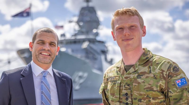 US Special Agent Justin Smith and Australian Army Captain Nicholas Wood pose in front of Royal Australian Navy frigate HMAS Warramunga at Joint Base Pearl Harbor-Hickam during Exercise Rim of the Pacific (RIMPAC) 2022. Story and photo by Leading Seaman Kylie Jagiello.