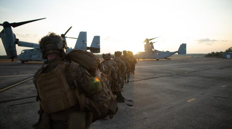 US Marines with 3d Battalion, 7th Marine Regiment, Ground Combat Element, Marine Rotational Force – Darwin load an MV-22 Osprey during an airfield seizure event at RAAF Base Darwin as part of Exercise Koolendong 2022. Story by Lieutenant Gordon Carr-Gregg. Photo by Corporal Cedar Barnes.
