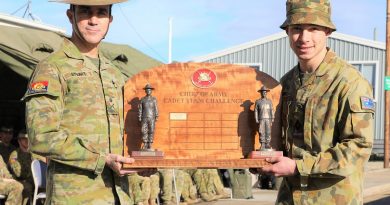 Chief of Army Lieutenant General Simon Stuart presents the Chief of Army trophy to Cadet Under Officer Kane Blake, leader of the winning team from the Victorian Army Cadets Brigade. Story by Sergeant Matthew Bickerton. Photo supplied.