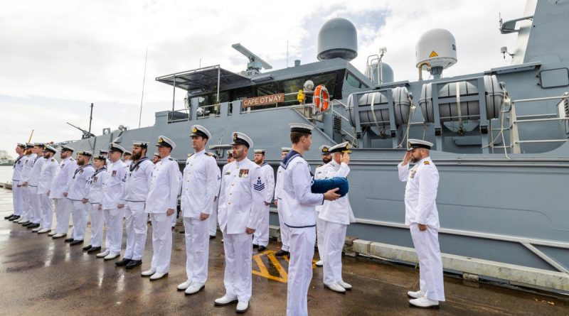 Deputy Chief of Navy Rear Admiral Christopher Smith inspects the ship's company of Australian Defence Vessel Cape Otway during the boat's official welcome to its home port of Cairns. Story by Lieutenant Nancy Cotton. Photo by Able Seaman Susan Mossop.