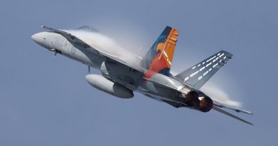 Royal Australian Air Force F/A-18A 'Worimi' Hornet conducts a handling display for its final flight before retirement at RAAF Base Williamtown, New South Wales. Photo by Corporal Craig Barrett.