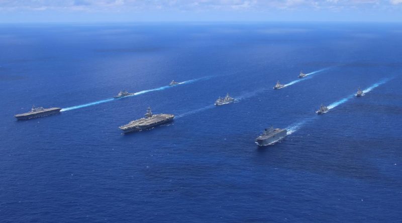 HMA Ships Canberra, Warramunga and Supply sail in formation with USS Abraham Lincoln, JS Izumo, USS Mobile Bay, USS Spruance, USS Gridley, JS Takanami, and USS Sampson in the Pacific Ocean. Story by Lieutenant Nancy Cotton. Photo by Leading Seaman Liam Sulley.