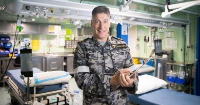 Lieutenant Commander Wesley Truscott in the sick bay on board HMAS Canberra. Story by Lieutenant Nancy Cotton. Photo by Leading Seaman Matthew Lyall.
