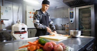 Maritime Logistics Chef Able Seaman Zachary Galit prepares vegetables in the galley of HMAS Canberra during Exercise Rim of the Pacific (RIMPAC) 2022 in the Pacific Ocean. Story and photo by Leading Seaman Matthew Lyall.