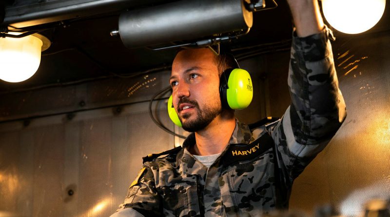 Assistant Marine Engineering Officer, Sub Lieutenant Jackson Harvey conducts maintenance checks on the gas turbine on-board HMAS Warramunga while on deployment. Story by Lieutenant Max Logan. Photo by Leading Seaman Daniel Goodman.