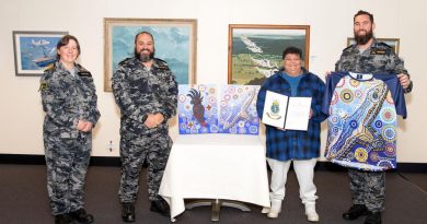 Captain Robyn Phillips, left, Petty Officer Jordon Bradshaw, Indigenous artist Kerrie Williams and Leading Seaman Callum Dawson at the Fleet Air Arm museum in Nowra. Story by Lieutenant Danielle Worthey. Photo by Leading Seaman Ryan Tascas.