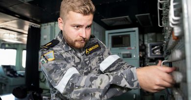 Able Seaman Electronics Technician Edward Simcock works on the navigation system on the bridge of HMAS Warramunga while on deployment. Story by Lieutenant Max Logan. Photo by Leading Seaman Daniel Goodman.