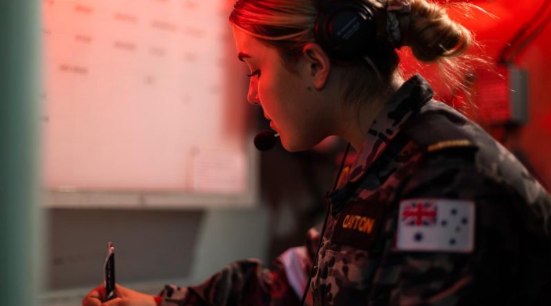 Able Seaman Chelsea Clayton works on the bridge of HMAS Warramunga during Exercise Rim of the Pacific (RIMPAC) 2022. Story by Lieutenant Max Logan. Photo by Leading Seaman Daniel Goodman.