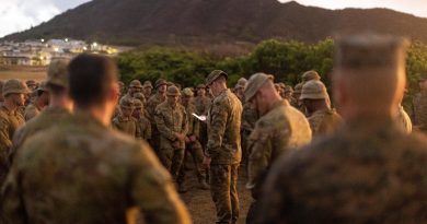 Captain David Wohlgemuth from the 2nd Battalion, Royal Australian Regiment reads the soldiers a prayer at a memorial service for the 69th anniversary of the Battle of Samichon at Marine Corps Base Hawaii. Story by Flying Officer Lily Lancaster. Photo by Leading Seaman Jarrod Mulvihill.