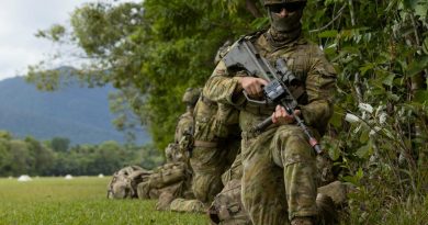 A soldier from the 3rd Battalion, Royal Australian Regiment, provides security at Jungle Training Wing, Tully, during Exercise Kalimantan. Story by Captain Diana Jennings. Photo by Bombardier Guy Sadler.