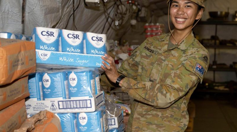 Private Maria Aniceto re-stocks catering supplies in the deployable catering capability at Camp Birt during the Army Aboriginal Community Assistance Program in Gapuwiyak, Northern Territory. Story by Captain Annie Richardson. Photo by Warrant Officer Class Two Kim Allen.