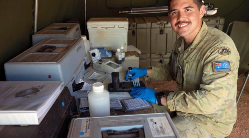 Private Adrian Fleming completes a daily field test of the purified water at Camp Birt during the Army Aboriginal Community Assistance Program in Gapuwiyak, Northern Territory. Story by Captain Annie Richardson. Photo: byWarrant Officer Class Two Kim Allen.