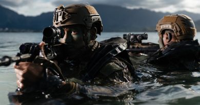 Soldiers from 2RAR secure a beach as part of a small-boat operations activity during RIMPAC. Photos: Corporal John Solomon.