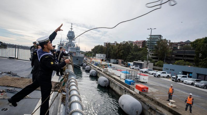 Combat Systems Operator Able Seaman Tony Luu throws a heaving line from HMAS Parramatta as the ship prepares to berth at Fleet Base East on return from a regional presence deployment. Story by Lieutenant Commander Andrew Herring. Photo by Leading Seaman Leo Baumgartner.