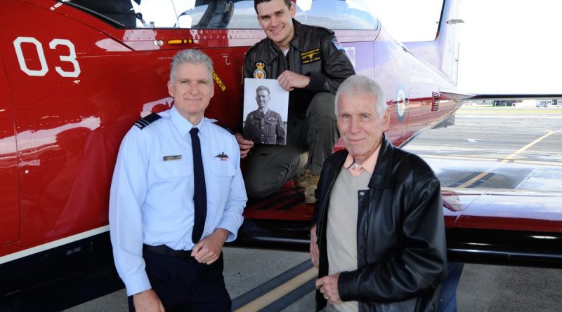 Pilot Officer Mitchell Kennedy, centre, with his father, grandfather and photo of his great-grandfather next to a PC-21 aircraft at RAAF Base Pearce. Story by Corporal Jacob Joseph. Photo by Chris Kershaw.
