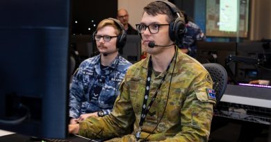 Corporal Jackson Smart, right, takes part in the space training exercise with Air Force air surveillance operator Leading Aircraftman Jasper Gleadhill at the Australian Space Discovery Centre. Story by Sergeant Matthew Bickerton. Photo by Leading Aircraftwoman Annika Smit.