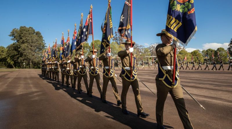 Royal Australian Infantry Corps parade their battalion colours during a ceremony held at the School of Infantry in Singleton to celebrate Queen’s Platinum Jubilee. Story by Corporal Jacob Joseph. Photo by Corporal Madhur Chitnis.