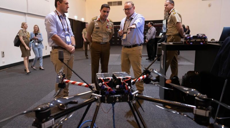 Chief of Army Lieutenant General Simon Stuart speaks with industry representatives during the Chief of Army Symposium 2022 at the Adelaide Convention Centre. Story by Warrant Officer Class Two Max Bree. Photo by Sergeant Tristan Kennedy.