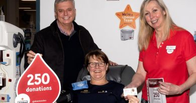 Flight Sergeant Christine Williams, with her husband Warren, at the Lifeblood Canberra Garran Donor Centre on the occasion of her 250th blood donation. Story by John Noble. Photo by Flight Sergeant Kev Berriman.