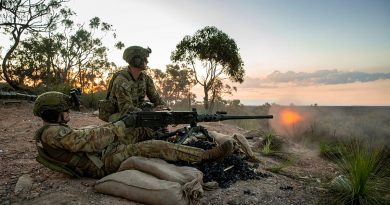 Army riflemen from the 6th Battalion, the Royal Australian Regiment fires a .50 cal heavy machine gun during an Integrated Gun Line Practice. Photo by Corporal Nicole Dorrett.