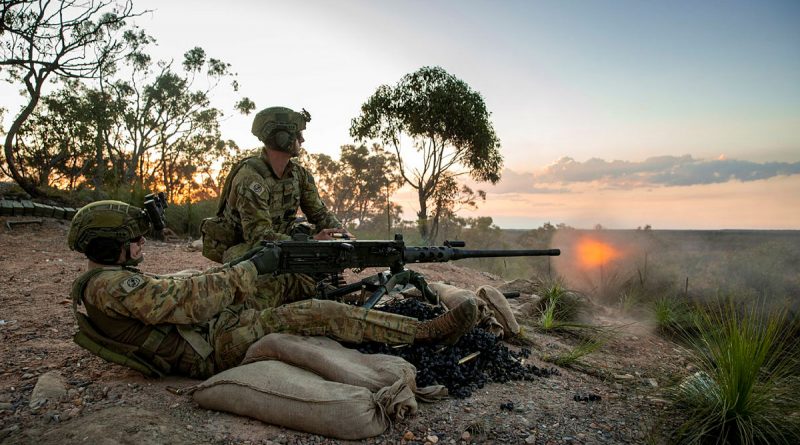 Army riflemen from the 6th Battalion, the Royal Australian Regiment fires a .50 cal heavy machine gun during an Integrated Gun Line Practice. Photo by Corporal Nicole Dorrett.