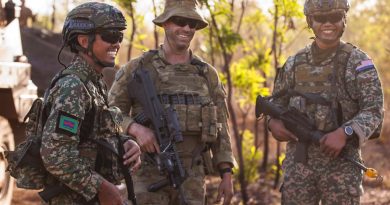 From left, Malaysian Armed Forces Battery Commander Major Fahmi A. Razak, Australian Army Command Post officer Lieutenant Toby Exton and Malaysian Armed Forces Forward Observer Captain Shauqi. Story by Major Megan McDermott. Photo by Corporal Dustin Anderson.