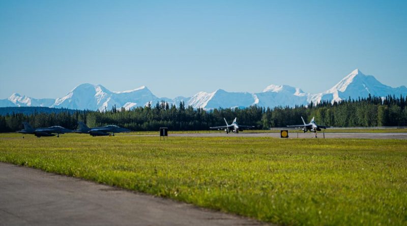 Four RAAF F/A-18F Super Hornets prepare for a mission at Eielson Air Force Base for Exercise Red Flag Alaska. Story by Leading Seaman Kylie Jagiello. Photo by Captain Benjamin Tait.