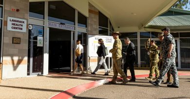 Commander of the 3rd Brigade Brigadier Kahlil Fegan escorts Royal Commissioners' Mr Nick Kaldas to the Lavarack Health Centre during his visit to the 3rd Brigade at Lavarack Barracks, Queensland. Photo by Corporal Brodie Cross.