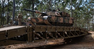 Lance Corporal Jesse McMah, from 2nd/14th Light Horse Regiment (Queensland Mounted Infantry) guides an M1A1 Abrams main battle tank over a medium girder bridge during training at Gallipoli Barracks, Brisbane. Story by Captain Cody Tsaousis. Photo by Corporal Nicole Dorrett.