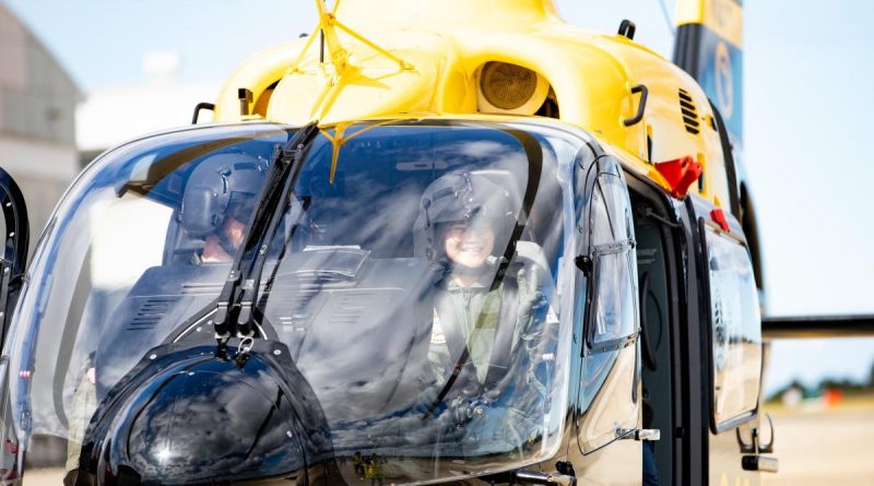 Chau Giang Phan prepares to depart for a flight in an EC-135 aircraft at HMAS Albatross. Story b y Lieutenant Commander Karen Dwyer. Photo by Leading Seaman Ryan Tascas.