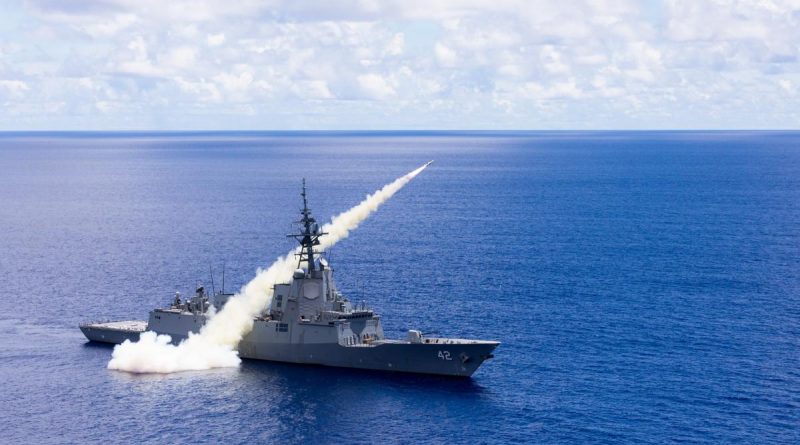 Hobart-class guided missile destroyer HMAS Sydney strikes a land target with a Harpoon surface-to-surface missile during Exercise Pacific Vanguard 2022. Story by Lieutenant Carolyn Martin.