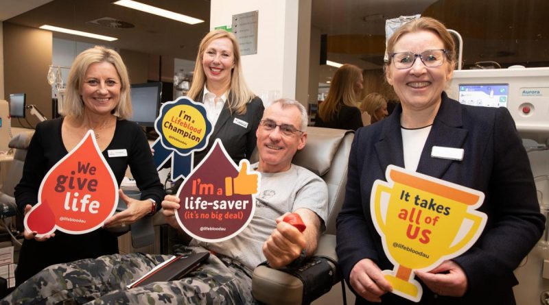 Meg, Sally and Cath from the Red Cross Lifeblood Centre with the Deputy Chief of Navy Rear Admiral Chris Smith as he donates plasma at the launch of the 2022 Defence Blood Challenge. Story by Sub-Lieutenant Tahlia Merigan. Photo by Petty Officer Bradley Darvill.