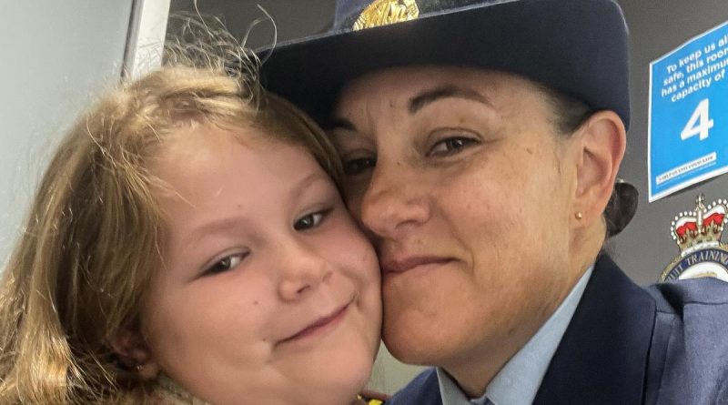 Flight Sergeant Shan Origliasso with her daughter Zahlee, wearing her father’s medals, are supported by Legacy after the loss of their partner and father Leith Walsh in 2019. Story by Corporal Melina Young. Photo by Flight Sergeant Shan Origliasso.