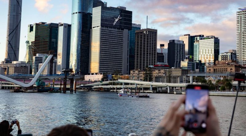 Crowds catch the action as an F/A-18F Super Hornet flies low and fast to celebrate the opening of the Brisbane Festival's Riverfire on September 3. Story by Flight Lieutenant Julia Ravell. Photo by Corporal Brett Sherriff.