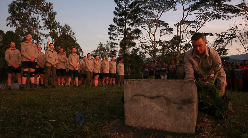 Lieutenant Colonel Leigh Partridge, commanding officer of the 16th Battalion, Royal Western Australia Regiment, lays a wreath during a dawn service commemorating 80 years since the start of the Battle of Brigade Hill, along the Kokoda Track, in Papua New Guinea. Story and photo by Warrant Officer Class Two Max Bree.