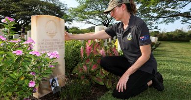 Army nursing officer Lieutenant Lorraine Cheesewright pays her respects at the grave of her great uncle, Corporal Frederick Cheesewright at the Port Moresby (Bomana) War Cemetery in Papua New Guinea. Story and photo by Warrant Officer Class Two Max Bree.