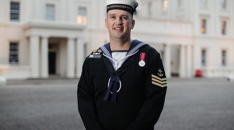 Leading Seaman Cameron Green at Wellington Barracks, London. Story by Lieutenant Anthony Martin. Photo by Corporal John Solomon.