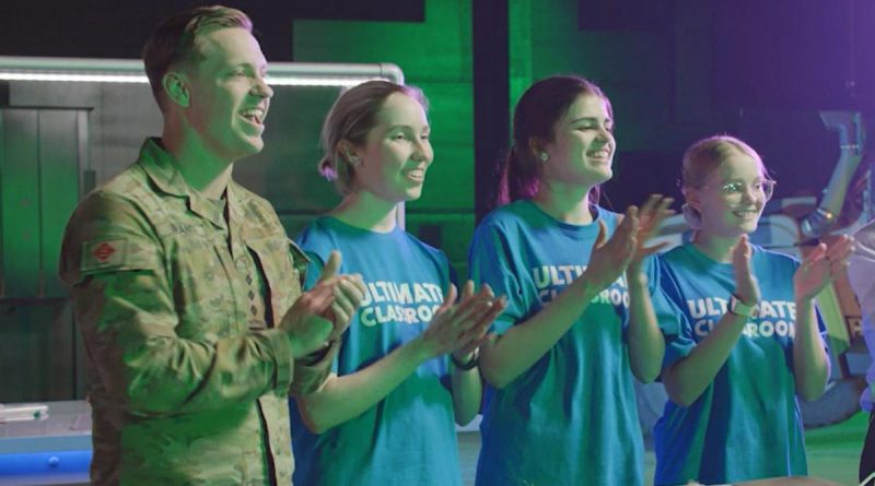 Captain Zac Bryant, from 6th Engineer Support Regiment, with students during the bridge-building challenge on Ultimate Classroom. Story by Corporal Jacob Joseph. Photo from Channel 10.
