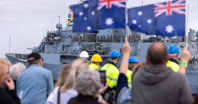 Family and friends wait on the wharf as HMAS Warramunga returns to Australia after completing a regional presence deployment. Story by Lieutenant Gary McHugh. Photo by Chief Petty Officer Yuri Ramsey.