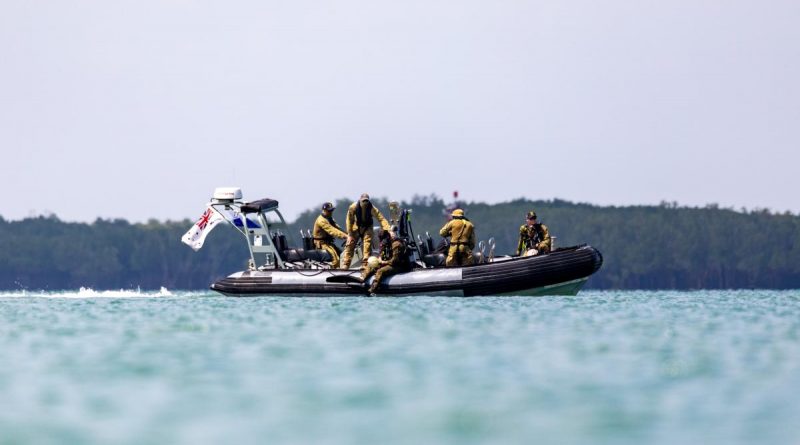 Navy divers render safe popular Darwin waterway