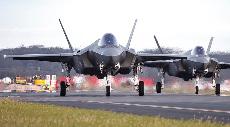 Australia's newest F-35A Lightning II aircraft A35-053 and A35-054 arrive at RAAF Base Williamtown in New South Wales, at the end of their ferry flight during exercise Lightning Ferry 22-3. Photo by Corporal Craig Barrett.