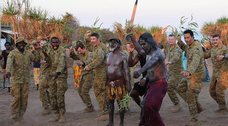 Yolgnu community, NORFORCE and other ADF personnel commemorate the 80th anniversary of the makarrata which formed the NTSRU with a bungul (Yolngu ceremony) at Raymangirr, East Arnhem Land, Northern Territory. Photo by Major Martin Hadley.