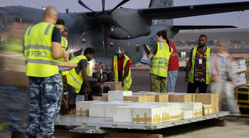 Australian Defence Force and Papua New Guinea Electoral Commission personnel begin sorting and loading ballot papers for PNG's 2022 election, at the Air Transport Wing – Port Moresby. Photo by Corporal Jonathan Goedhart.
