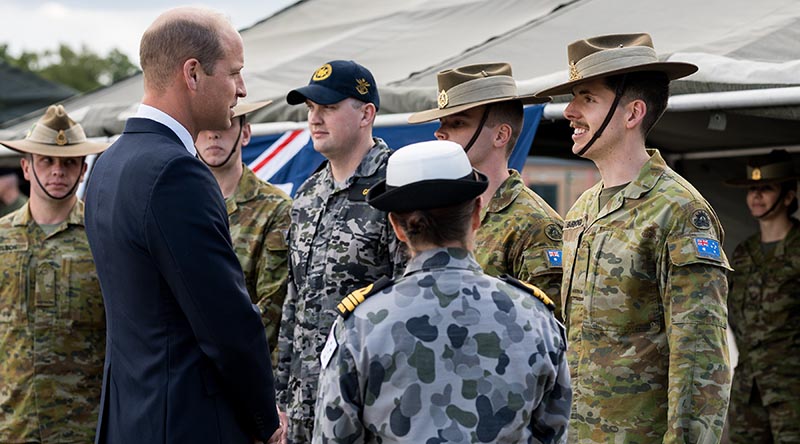 His Royal Highness the Prince of Wales speaks with Australian Army soldier Gunner Nicholas Burrough at Pirbright Army Barracks, near London. Photo by Corporal John Solomon.