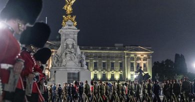 The commonwealth contingent passes Buckingham Palace during an early morning rehearsal for the Queen's funeral procession. Photo supplied by New Zealand Defence Force.